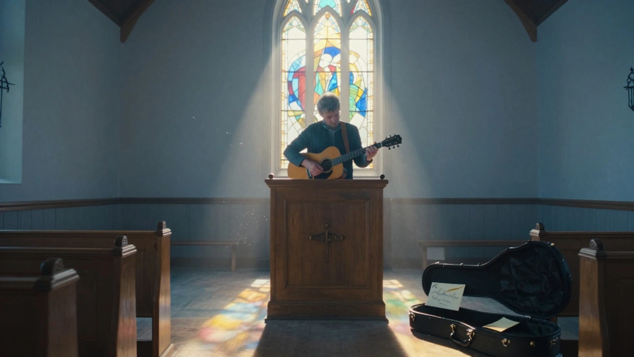 Robert Hill plays in a sunlit church, an envelope in his open guitar case, dawn light filtering through stained glass.