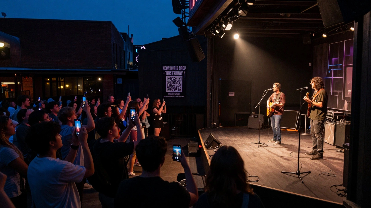 A small crowd recording a live performance at a local venue with a 'New Single Drop' poster in the background.