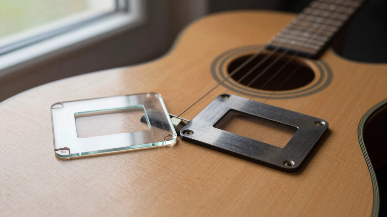 A glass slide and a metal slide resting on a resonator guitar body